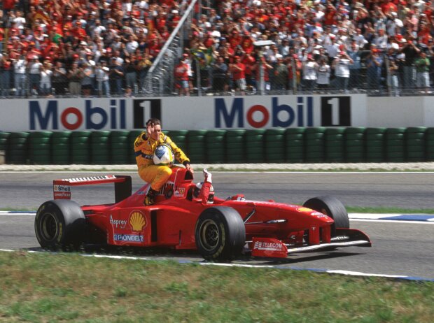 Michael Schumacher, Giancarlo Fisichella Michael Schumacher, Giancarlo Fisichella