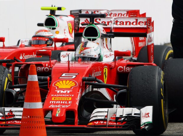 Sebastian Vettel, Kimi Räikkönen Sebastian Vettel, Kimi Räikkönen