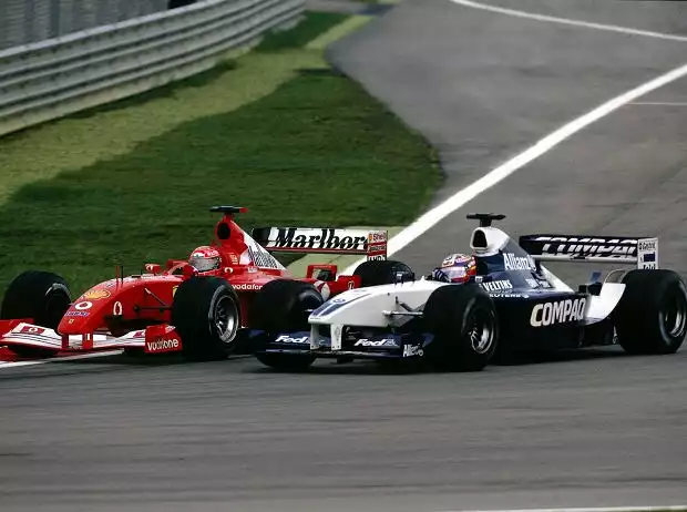Michael Schumacher und Juan Pablo Montoya Titel-Bild zur News: Michael Schumacher und Juan Pablo Montoya