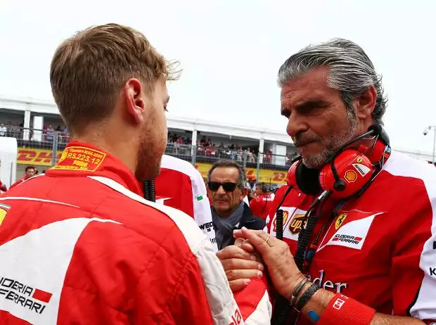 Titel-Bild zur News: Sebastian Vettel, Maurizio Arrivabene
