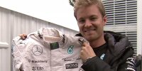 Bild zum Inhalt: Nico Rosberg spendet Rennanzug und Handschuhe für guten Zweck
