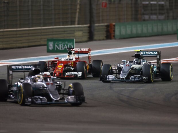 Sebastian Vettel, Nico Rosberg, Lewis Hamilton Sebastian Vettel, Nico Rosberg, Lewis Hamilton
