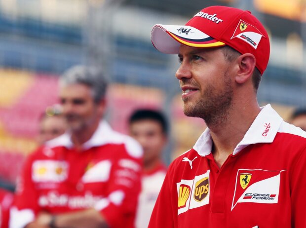 Sebastian Vettel, Maurizio Arrivabene Sebastian Vettel, Maurizio Arrivabene