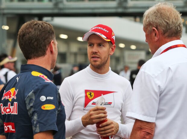 Titel-Bild zur News: Christian Horner, Sebastian Vettel, Helmut Marko