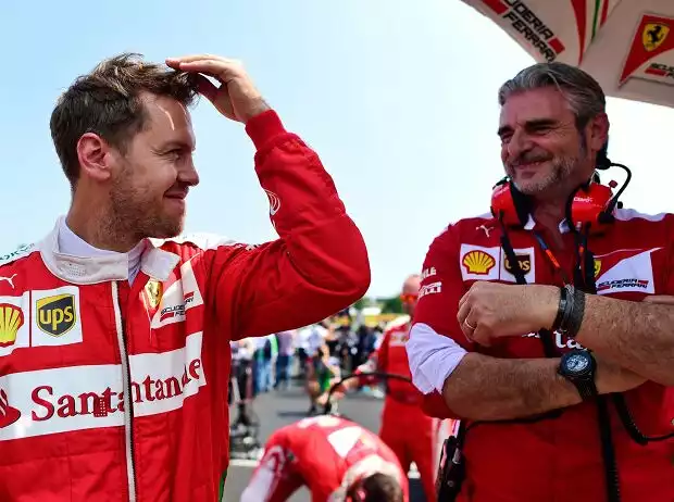 Titel-Bild zur News: Sebastian Vettel, Maurizio Arrivabene