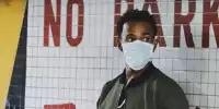 Lewis Hamilton mit Mundschutz