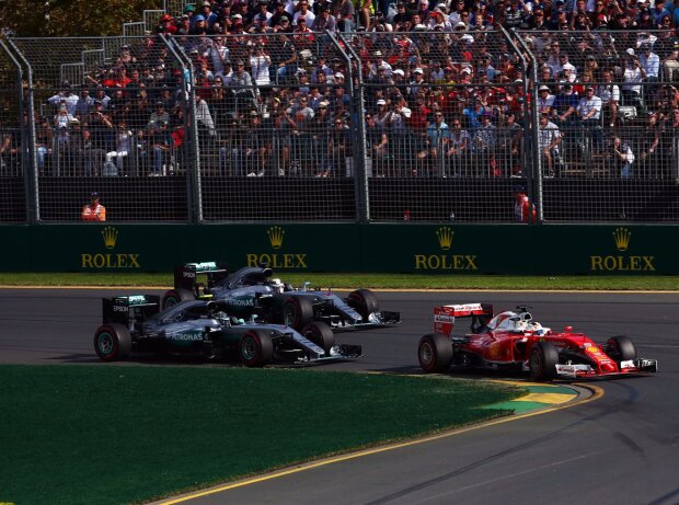 Sebastian Vettel, Lewis Hamilton, Nico Rosberg Sebastian Vettel, Lewis Hamilton, Nico Rosberg