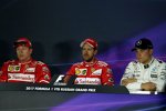 Sebastian Vettel (Ferrari), Valtteri Bottas (Mercedes) und Kimi Räikkönen (Ferrari) 