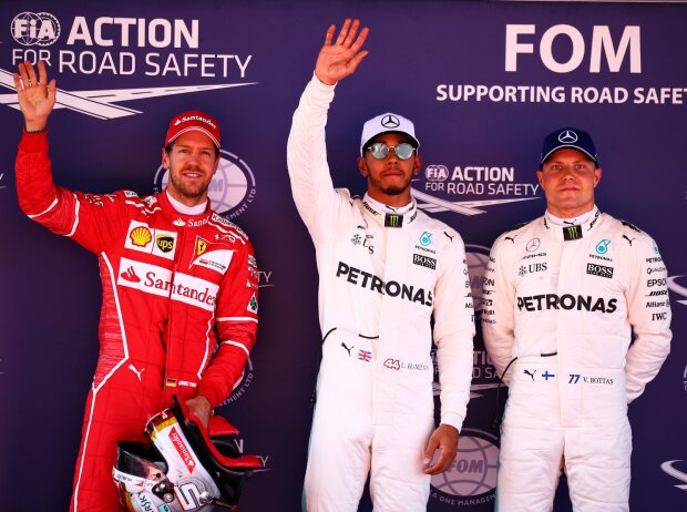 Titel-Bild zur News: Sebastian Vettel, Lewis Hamilton, Valtteri Bottas