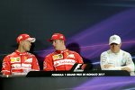 Sebastian Vettel (Ferrari), Valtteri Bottas (Mercedes) und Kimi Räikkönen (Ferrari) 
