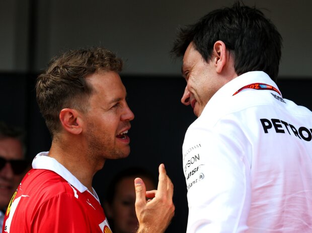Titel-Bild zur News: Sebastian Vettel, Toto Wolff