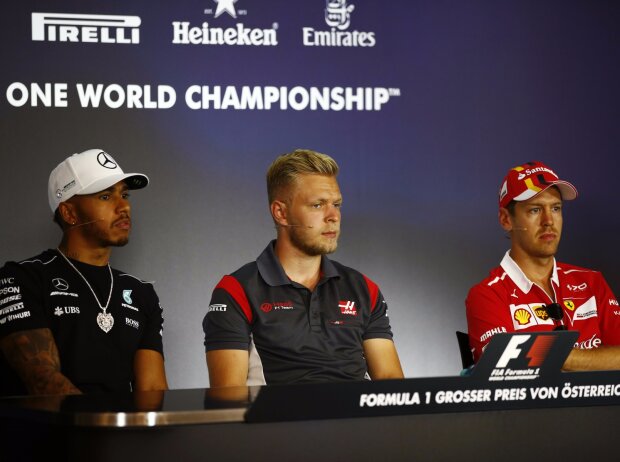 Lewis Hamilton, Romain Grosjean, Sebastian Vettel Lewis Hamilton, Romain Grosjean, Sebastian Vettel