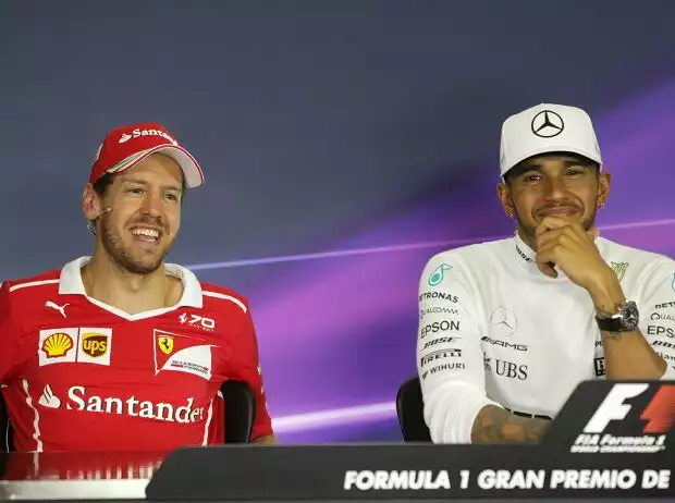 Titel-Bild zur News: Sebastian Vettel, Lewis Hamilton