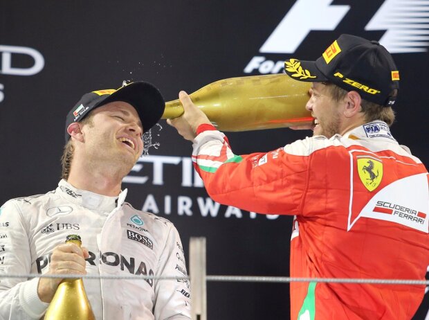 Nico Rosberg, Sebastian Vettel Nico Rosberg, Sebastian Vettel
