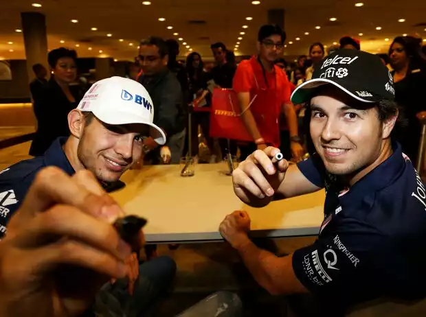 Titel-Bild zur News: Esteban Ocon, Sergio Perez