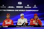 Sebastian Vettel (Ferrari), Valtteri Bottas (Mercedes) und Kimi Räikkönen (Ferrari) 