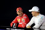 Sebastian Vettel (Ferrari) und Valtteri Bottas (Mercedes) 