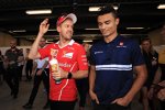 Sebastian Vettel (Ferrari) und Pascal Wehrlein (Sauber) 