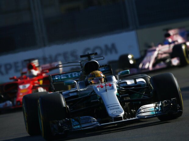 Lewis Hamilton, Sebastian Vettel, Sergio Perez Lewis Hamilton, Sebastian Vettel, Sergio Perez