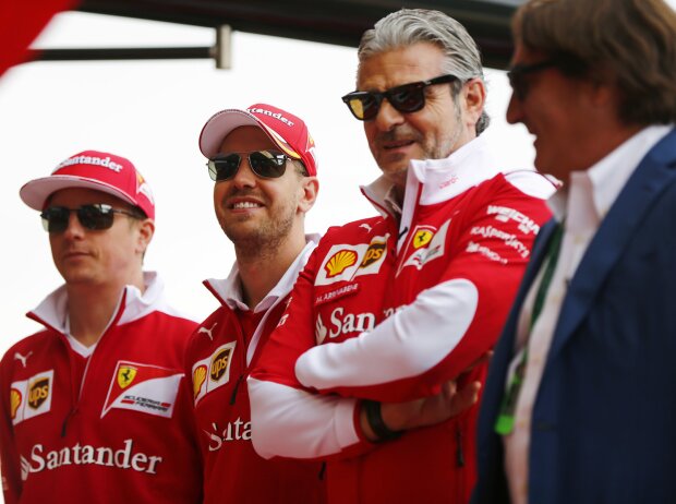 Titel-Bild zur News: Kimi Räikkönen, Sebastian Vettel, Maurizio Arrivabene
