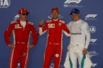 Sebastian Vettel (Ferrari), Kimi Räikkönen (Ferrari) und Valtteri Bottas (Mercedes) 