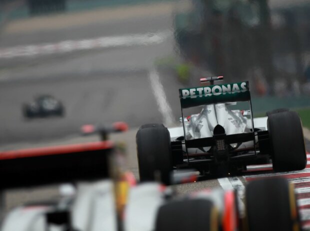 Nico Rosberg, Michael Schumacher, Jenson Button Nico Rosberg, Michael Schumacher, Jenson Button