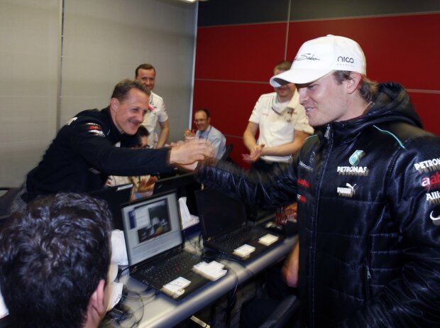 Michael Schumacher, Nico Rosberg Michael Schumacher, Nico Rosberg