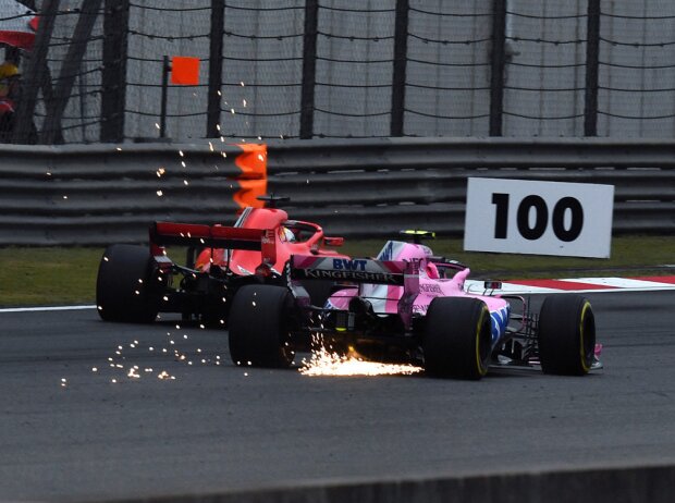Titel-Bild zur News: Esteban Ocon, Sebastian Vettel