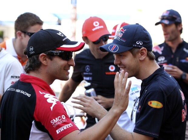 Titel-Bild zur News: Timo Glock, Sebastian Vettel