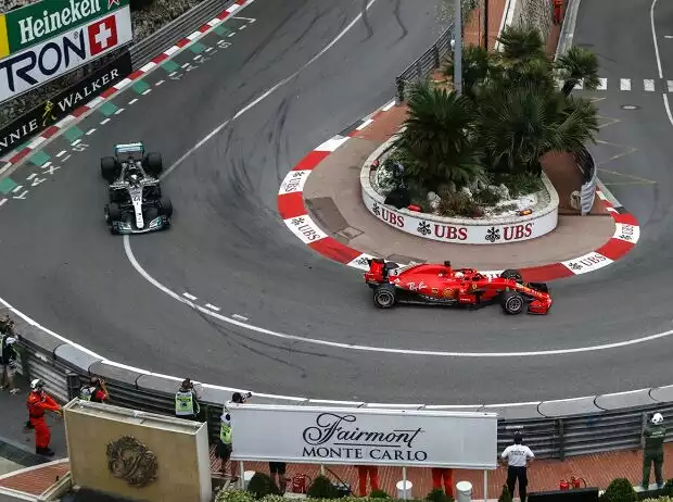 Titel-Bild zur News: Sebastian Vettel, Lewis Hamilton