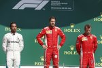 Lewis Hamilton (Mercedes), Sebastian Vettel (Ferrari) und Kimi Räikkönen (Ferrari) 