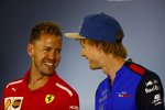 Sebastian Vettel (Ferrari) und Brendon Hartley (Toro Rosso) 