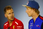 Sebastian Vettel (Ferrari) und Brendon Hartley (Toro Rosso) 