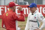 Sebastian Vettel (Ferrari) und Valtteri Bottas (Mercedes) 