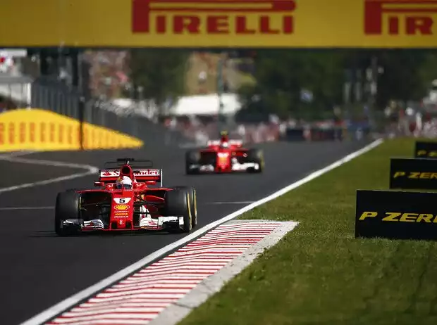 Sebastian Vettel, Kimi Räikkönen Titel-Bild zur News: Sebastian Vettel, Kimi Räikkönen