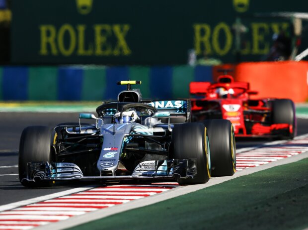 Valtteri Bottas, Sebastian Vettel Valtteri Bottas, Sebastian Vettel