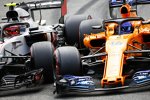 Kevin Magnussen (Haas) und Fernando Alonso (McLaren) 