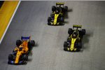 Fernando Alonso (McLaren), Carlos Sainz (Renault) und Nico Hülkenberg (Renault) 