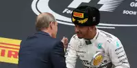Bild zum Inhalt: Mit Champagner bespritzt: Hamilton verteidigt sich bei Putin