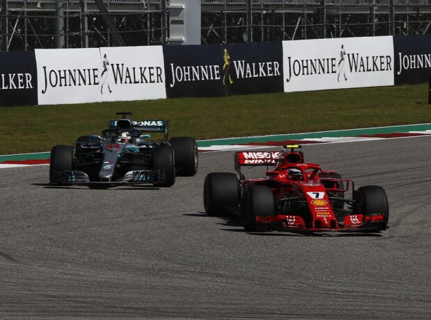 Titel-Bild zur News: Kimi Räikkönen, Lewis Hamilton