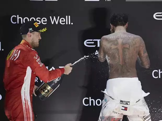 Titel-Bild zur News: Sebastian Vettel, Lewis Hamilton