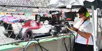 Kamerafrau bei der Formel 1