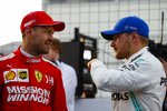 Sebastian Vettel (Ferrari) und Valtteri Bottas (Mercedes) 