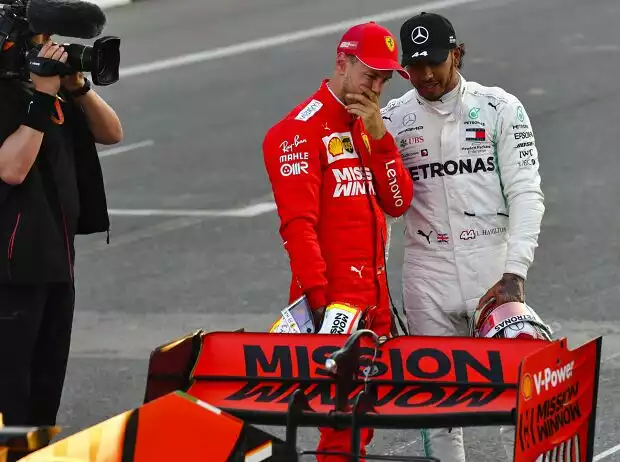 Titel-Bild zur News: Sebastian Vettel, Lewis Hamilton