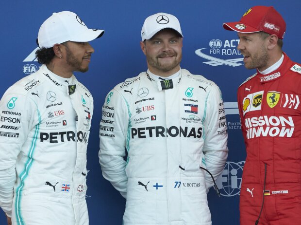 Lewis Hamilton, Valtteri Bottas, Sebastian Vettel Lewis Hamilton, Valtteri Bottas, Sebastian Vettel