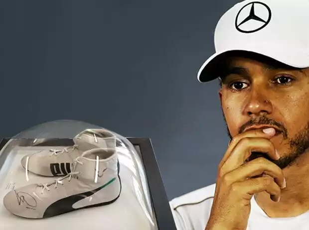 Titel-Bild zur News: Ersteigern Sie getragene und signierte Rennschuhe vom amtierenden Formel 1-Weltmeister Lewis Hamilton