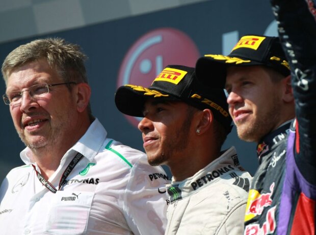 Ross Brawn, Lewis Hamilton, Sebastian Vettel Ross Brawn, Lewis Hamilton, Sebastian Vettel