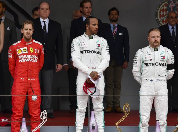 Titel-Bild zur News: Sebastian Vettel, Lewis Hamilton, Valtteri Bottas