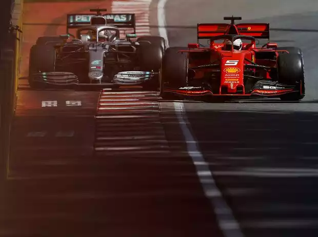 Titel-Bild zur News: Sebastian Vettel, Lewis Hamilton