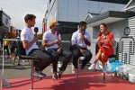 Lando Norris (McLaren), Carlos Sainz (McLaren) und Karun Chandhok 